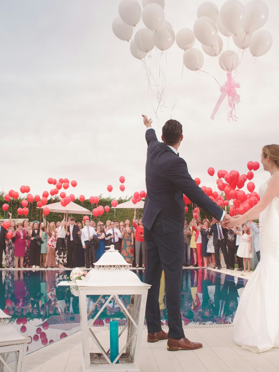Newlyweds celebrating beside the pool